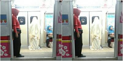 إندونيسيا: إمرأة  تؤدي صلاة الصبح  في عربة  قطار