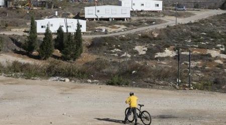 الكنيست الإسرائيلي يقر مشروع قانون معدلا يقنن المستوطنات
