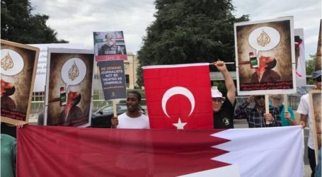 مظاهرة أمام مكتب الأمم المتحدة بجنيف رفضا لحصار قطر